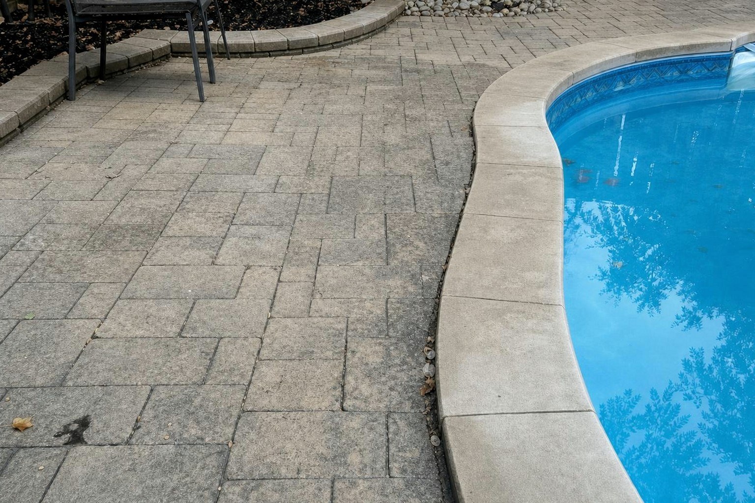 The same pool surround cleaned and re-sanded