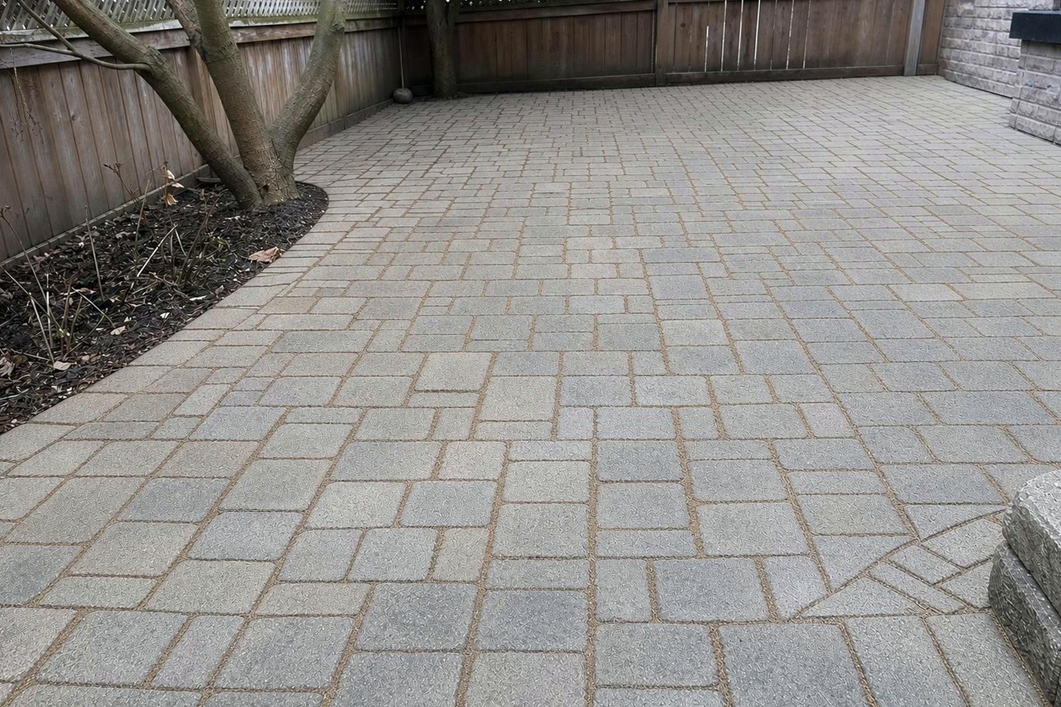 The same patio cleaned back to original colour and re-sanded