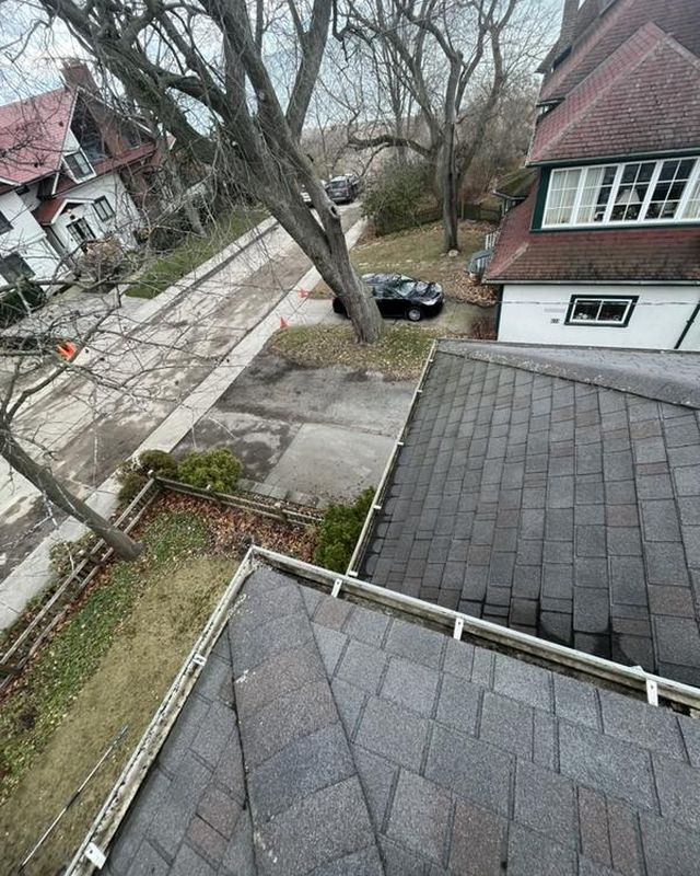 The same gutter after clearing, clean and clear