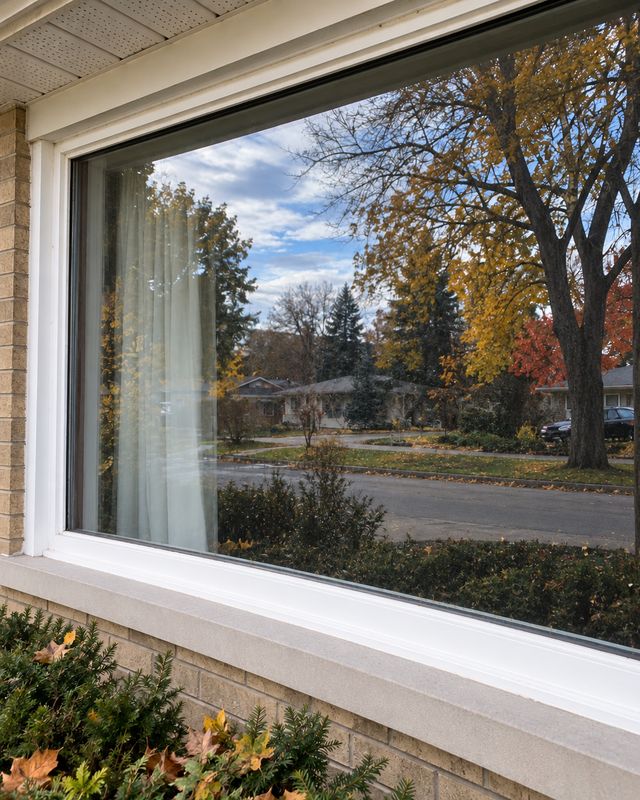 The same picture window after cleaning, glass clear and the frame wiped
